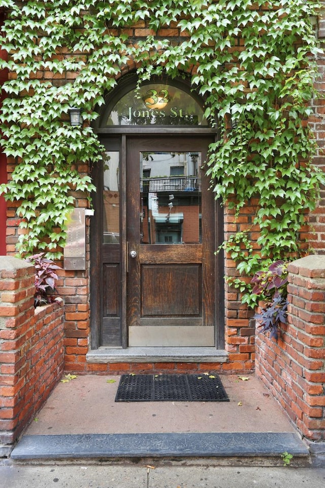 32 Jones St Unit 2D, New York City, NY 10014 - entrance to property featuring brick siding