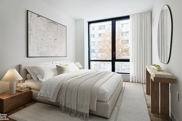 23 W 116th St Unit 4H, New York City, NY 10026 - bedroom with light wood-style floors