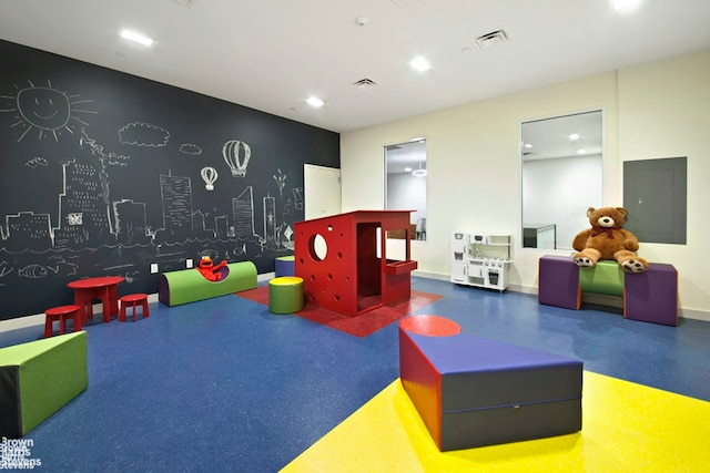 23 W 116th St Unit 4H, New York City, NY 10026 - playroom with recessed lighting and baseboards