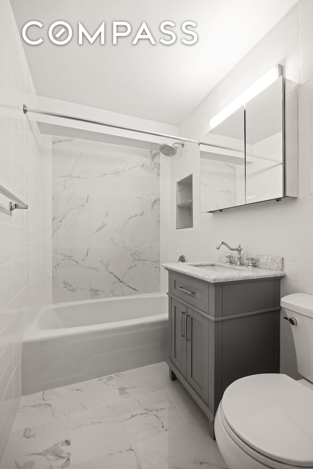 135 Ocean Pkwy Unit 9M, New York City, NY 11218 - full bath with vanity, bathing tub / shower combination, and marble look tile flooring