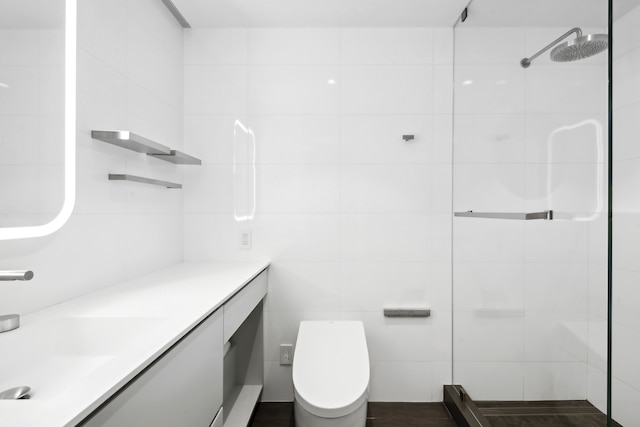 15 W 53rd St Unit 20E, New York City, NY 10019 - full bathroom with tiled shower, vanity, and tile walls
