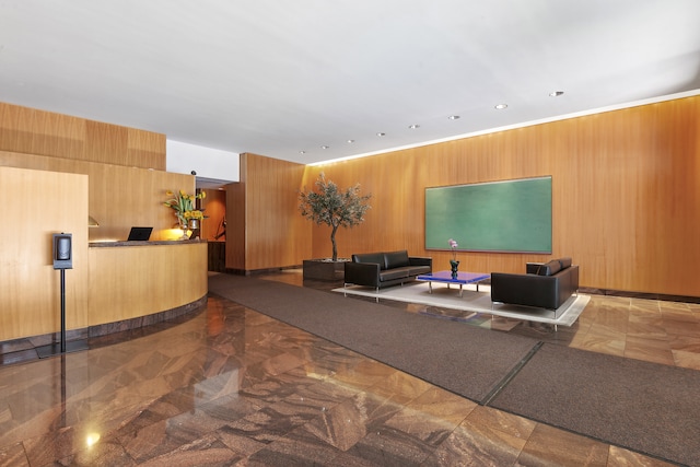 15 W 53rd St Unit 20E, New York City, NY 10019 - welcome area featuring recessed lighting and wooden walls