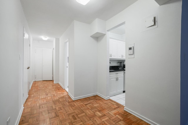 320 E 35th St Unit 2H, New York City, NY 10016 - corridor featuring baseboards