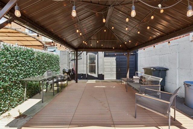 31-28 56th St, New York City, NY 11377 - wooden deck featuring a gazebo and a grill