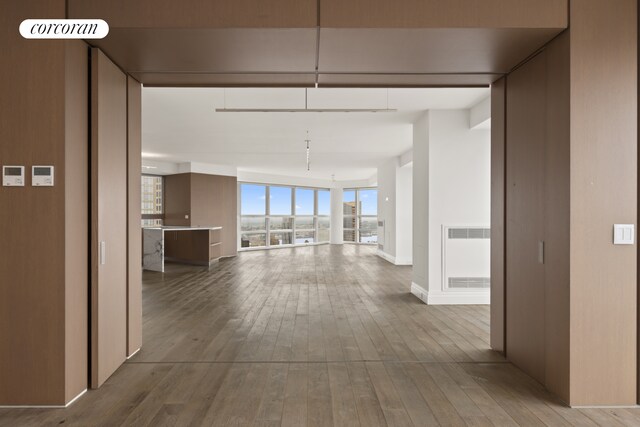 146 W 57th St Pha, Pha, New York City, NY 10019 - corridor with hardwood / wood-style floors and a wall of windows