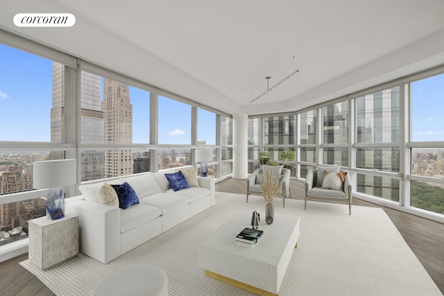 146 W 57th St Pha, Pha, New York City, NY 10019 - sunroom with wood finished floors and a view of city
