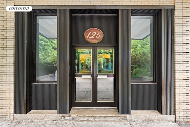 125 Ocean Ave Unit 6F, New York City, NY 11225 - view of exterior entry with french doors and brick siding