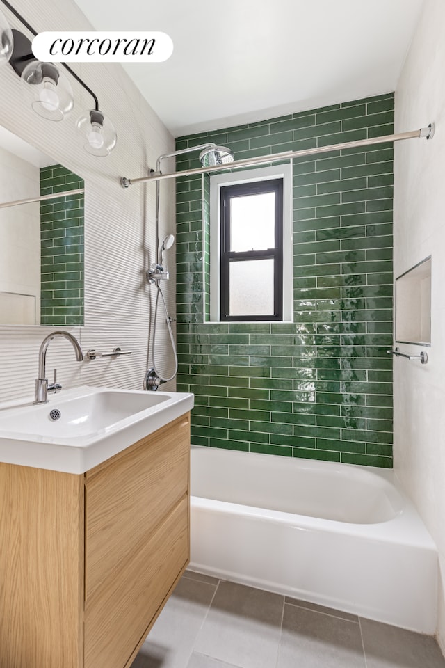 125 Ocean Ave Unit 6F, New York City, NY 11225 - bathroom with tile patterned floors, vanity, and bathtub / shower combination