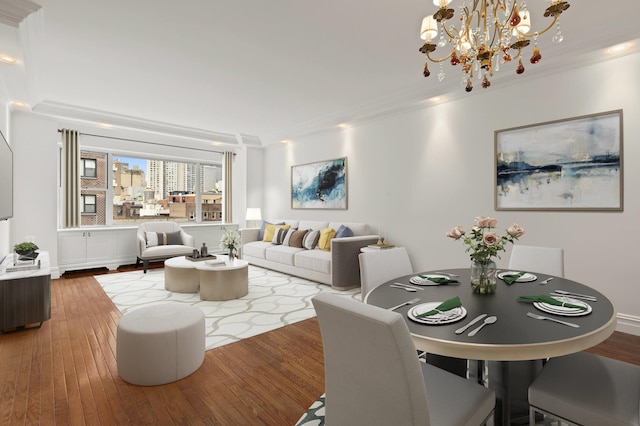340 E 64th St Unit 9-B, New York City, NY 10065 - living area with crown molding, wood-type flooring, and a chandelier