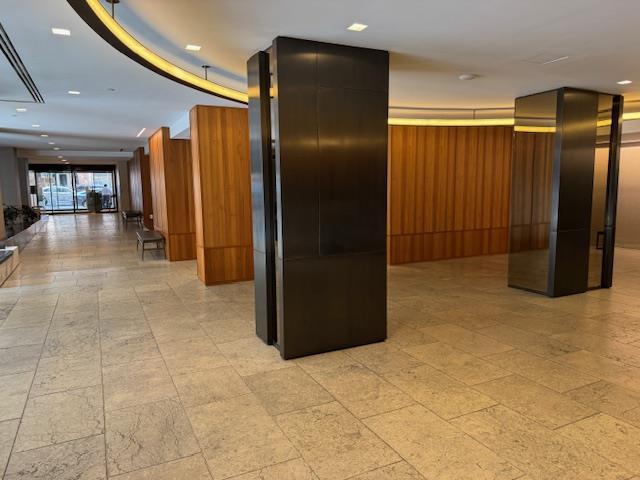 340 E 64th St Unit 9-B, New York City, NY 10065 - building lobby featuring recessed lighting