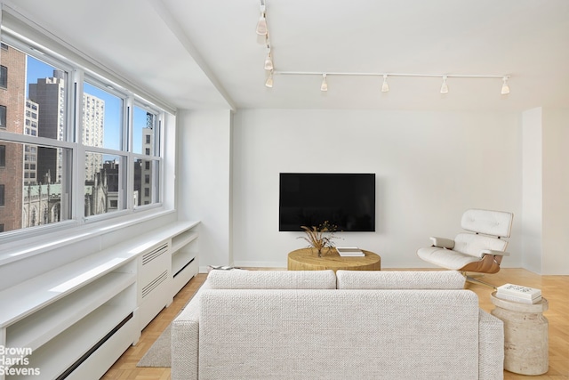 63 E 9th St Unit 9G, New York City, NY 10003 - living room with rail lighting