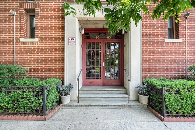 30-83 Crescent St Unit 3A, New York City, NY 11102 - doorway to property featuring brick siding