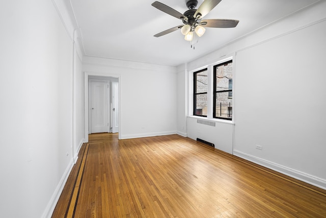 30-83 Crescent St Unit 3A, New York City, NY 11102 - empty room featuring ceiling fan and hardwood / wood-style floors