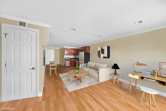 248 E 33rd Street Townhouse, New York City, NY 10016 - living room with crown molding, light wood finished floors, and recessed lighting