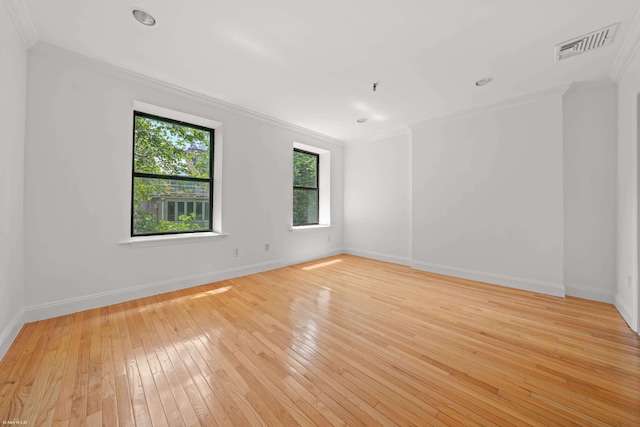 248 E 33rd Street Townhouse, New York City, NY 10016 - empty room with ornamental molding, light wood-style floors, and recessed lighting