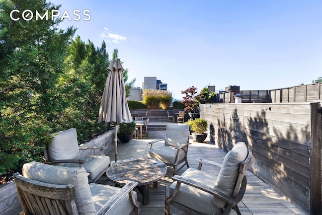 125 Watts St Unit 1, New York City, NY 10013 - view of patio featuring a deck and outdoor dining space