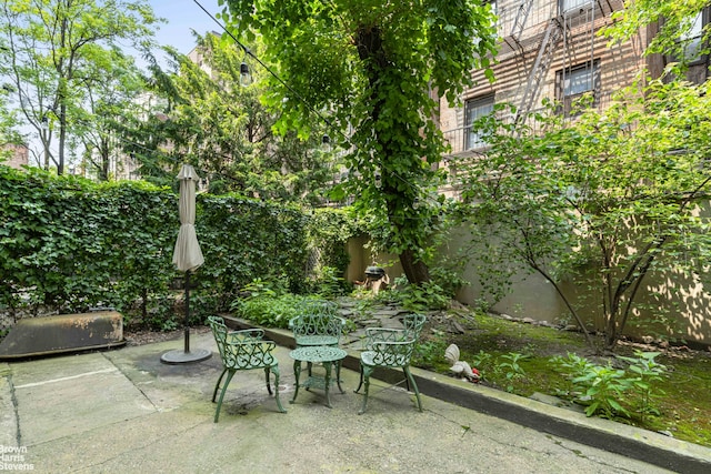 433 W 46th St Unit 1Rw, New York City, NY 10036 - view of patio / terrace featuring outdoor dining area