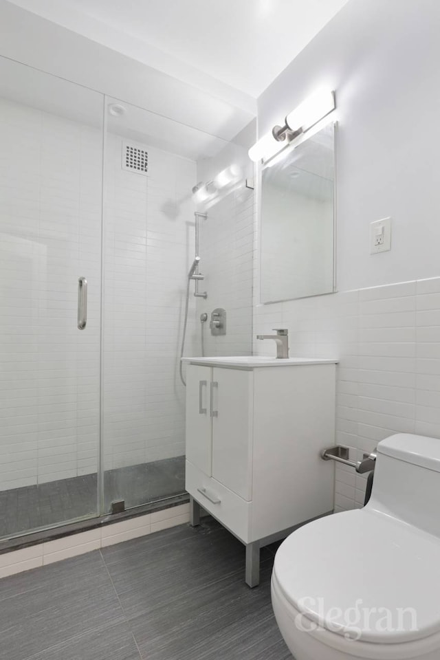 333 E 14th St Unit 5L, New York City, NY 10003 - full bath with tile walls, vanity, and a stall shower