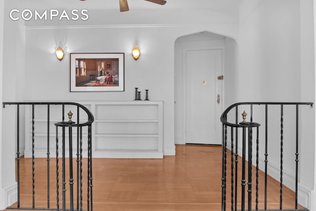 200 Pinehurst Ave Unit 5C, New York City, NY 10033 - hall featuring wood finished floors and arched walkways