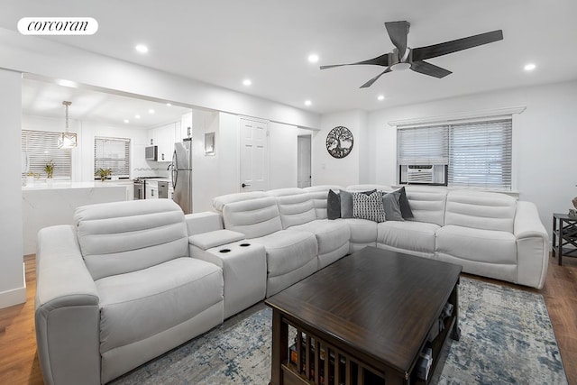 34-10 94th St Unit 1A, New York City, NY 11372 - living area with ceiling fan, wood finished floors, recessed lighting, and cooling unit