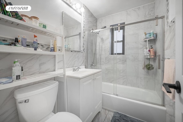 34-10 94th St Unit 1A, New York City, NY 11372 - bathroom with bath / shower combo with glass door, vanity, and marble look tiles