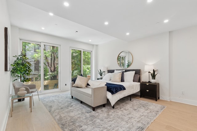 53 W 119th St Unit 1, New York City, NY 10026 - bedroom with light wood-style flooring and recessed lighting