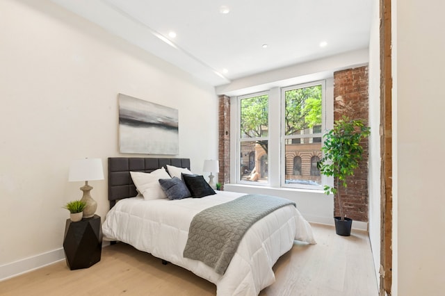 53 W 119th St Unit 1, New York City, NY 10026 - bedroom with light wood finished floors and recessed lighting