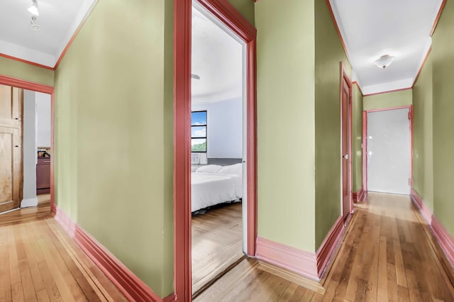 110 Cambridge Pl Unit 5-B, New York City, NY 11238 - hall featuring light wood-style floors and ornamental molding