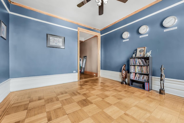 110 Cambridge Pl Unit 5-B, New York City, NY 11238 - empty room with wainscoting, a ceiling fan, and ornamental molding