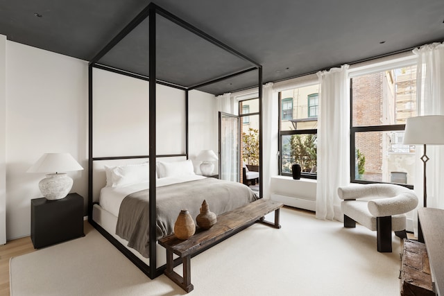 415 Washington St Unit 5A, New York City, NY 10013 - bedroom featuring multiple windows