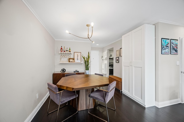250 W 15th St Unit 6F, New York City, NY 10011 - dining space with ornamental molding, a dry bar, and dark wood-style floors