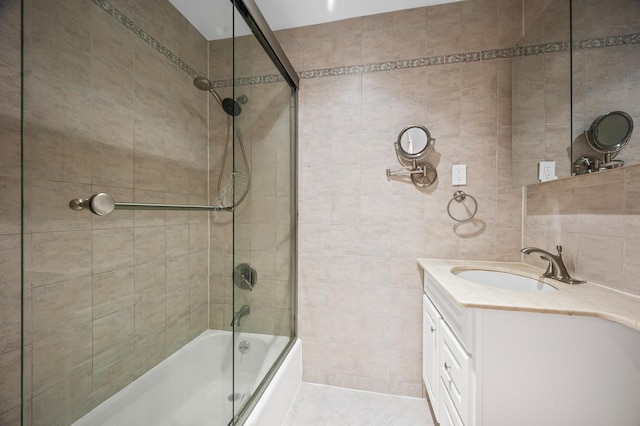 250 W 15th St Unit 6F, New York City, NY 10011 - full bath featuring tile walls, bathing tub / shower combination, and vanity