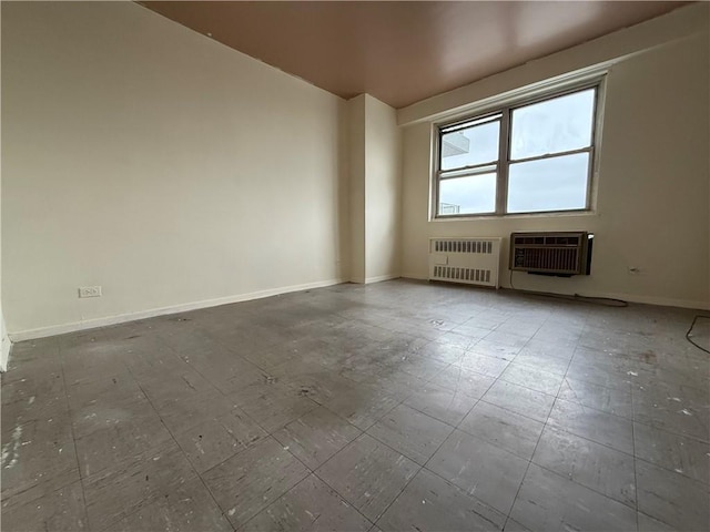 2475 W 16th St Unit 18-G, New York City, NY 11214 - empty room with heating unit and radiator heating unit