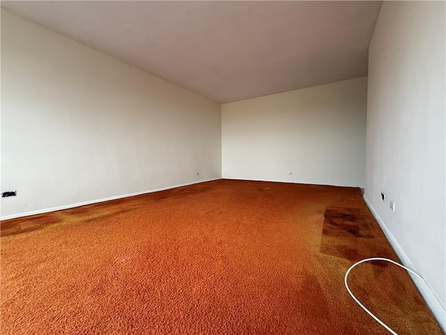 2475 W 16th St Unit 18-G, New York City, NY 11214 - spare room featuring carpet flooring and baseboards