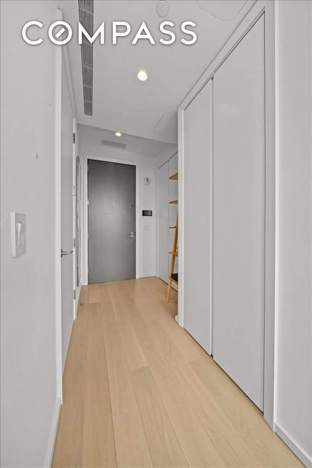 8 S 4th St Unit 15D, New York City, NY 11249 - hallway featuring light wood-style flooring