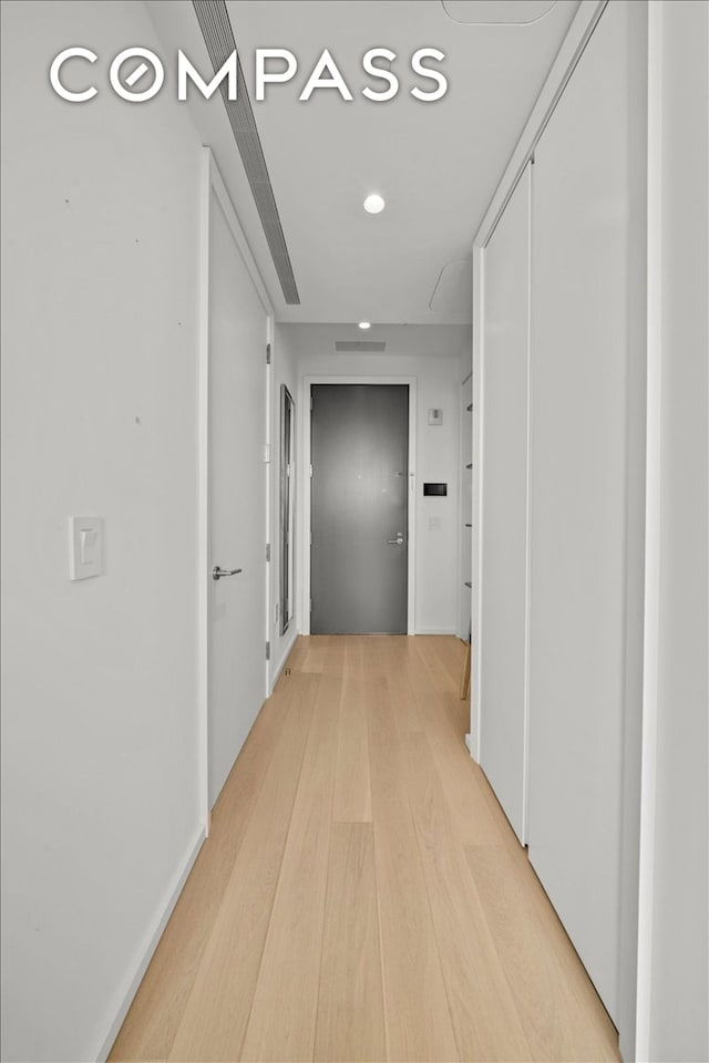 8 S 4th St Unit 15D, New York City, NY 11249 - hall with light wood-style flooring and recessed lighting