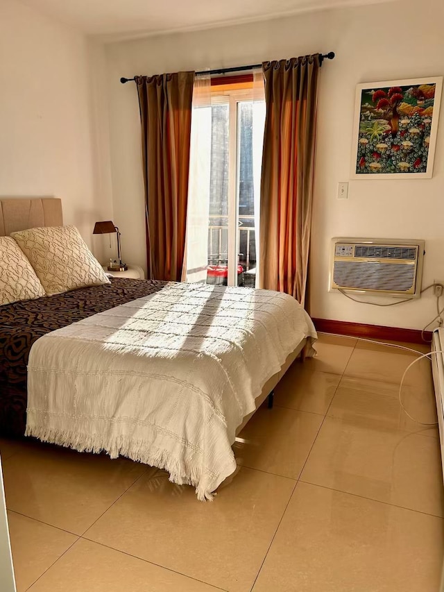 53-10 90th St Unit 4-B, New York City, NY 11373 - bedroom featuring a wall mounted AC, access to exterior, and tile patterned floors