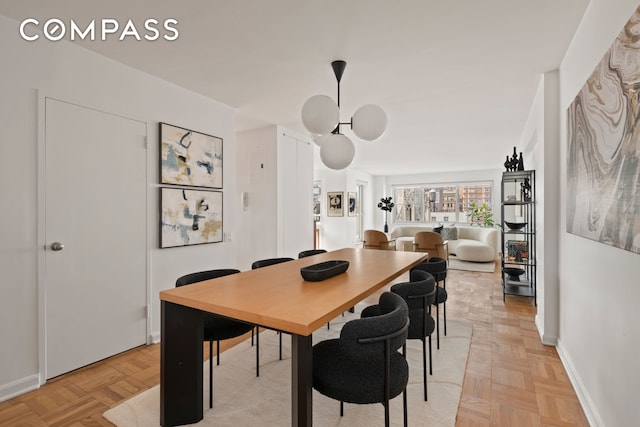 70 E 10th St Unit 15R, New York City, NY 10003 - dining room with baseboards