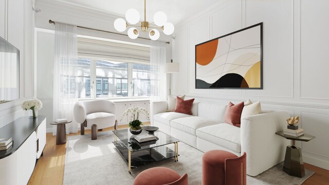 80 Riverside Blvd Unit 7-A, New York City, NY 10069 - living area with a decorative wall, a chandelier, light wood finished floors, and crown molding