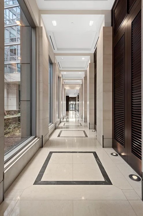 80 Riverside Blvd Unit 7-A, New York City, NY 10069 - corridor featuring inlaid floor details and healthy amount of natural light