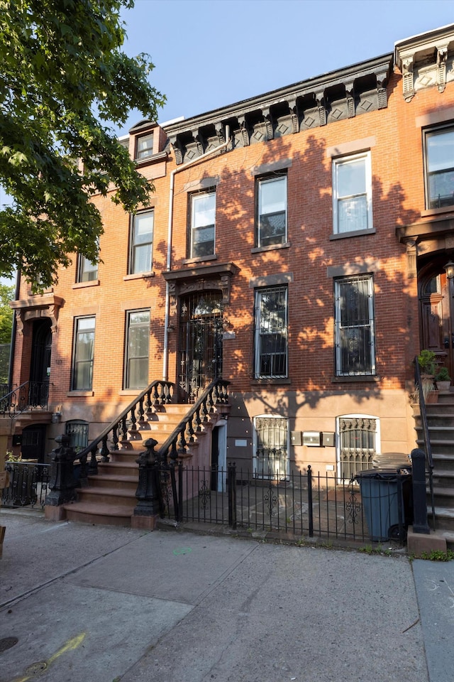 125 Washington Ave, New York City, NY 11205 - view of front of property featuring brick siding and stairs