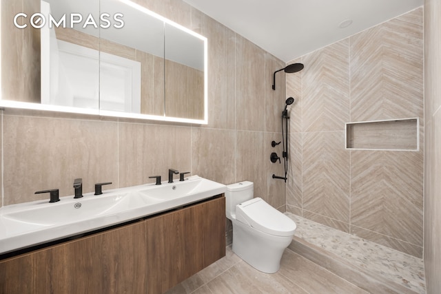 90 Herbert St Unit Th1, New York City, NY 11222 - full bathroom featuring double vanity, tile walls, a tile shower, and tile patterned floors