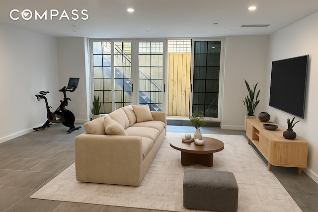 90 Herbert St Unit Th1, New York City, NY 11222 - tiled living room featuring baseboards and recessed lighting