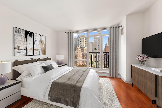 45 Park Ave Unit 1105, New York City, NY 10016 - bedroom featuring light wood-style flooring and baseboards