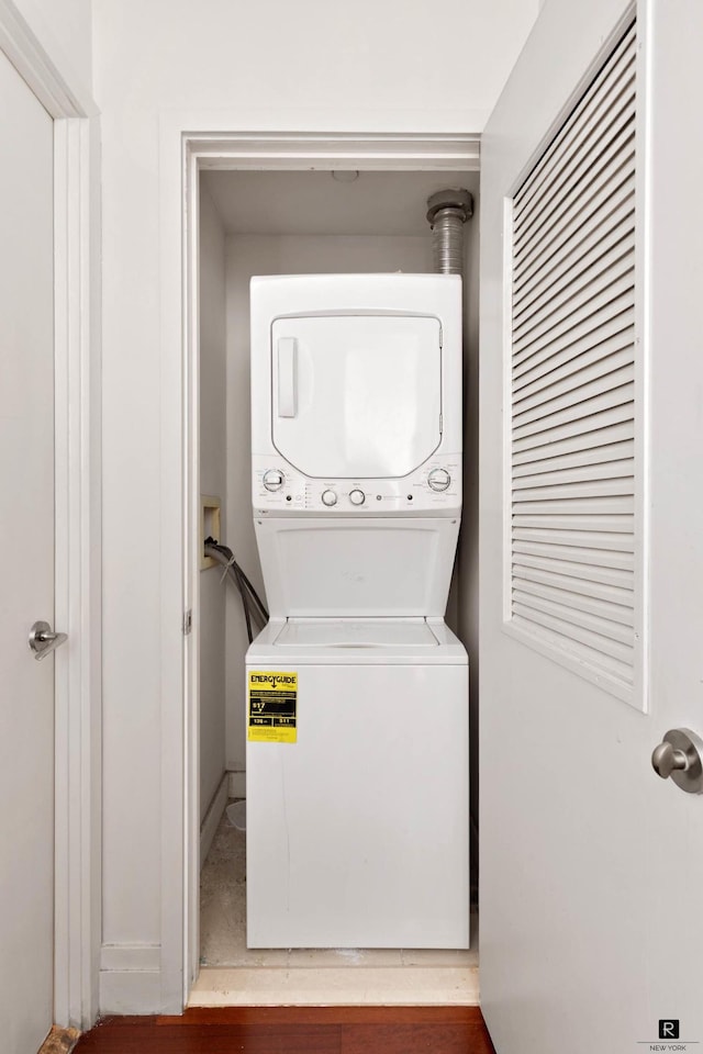 45 Park Ave Unit 1105, New York City, NY 10016 - laundry room featuring stacked washer and clothes dryer