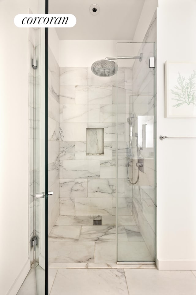 509 Pacific St Unit 4J, New York City, NY 11217 - bathroom with a marble finish shower and baseboards