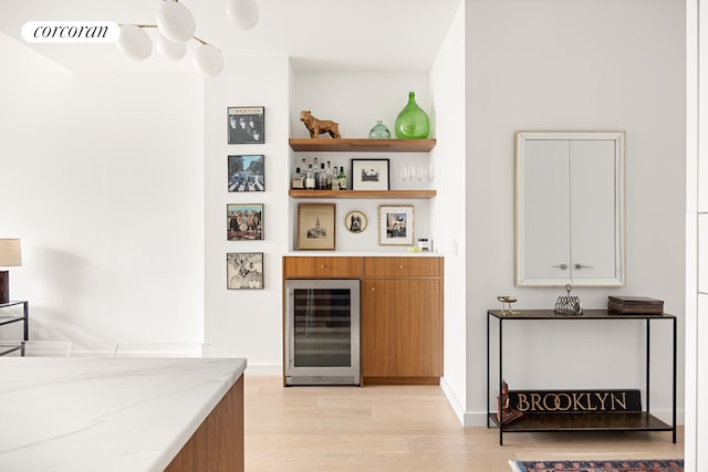 509 Pacific St Unit 4J, New York City, NY 11217 - indoor dry bar featuring beverage cooler and light wood finished floors