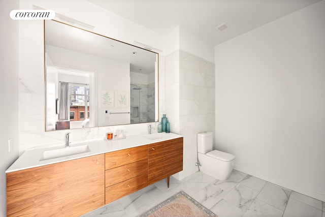 509 Pacific St Unit 4J, New York City, NY 11217 - bathroom featuring marble finish flooring, double vanity, and a shower