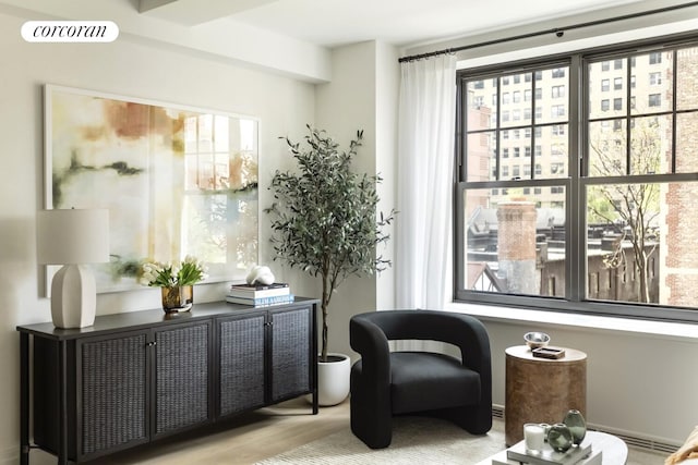 720 W End Ave Unit 5F, New York City, NY 10025 - sitting room with healthy amount of natural light and wood finished floors