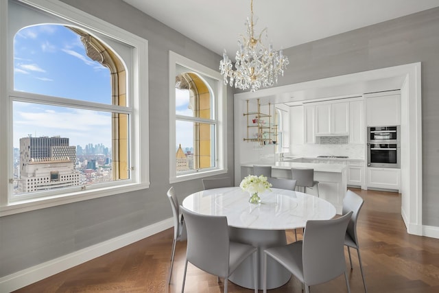 2 Park Pl Unit 41B, New York City, NY 10007 - dining room featuring a chandelier and dark wood finished floors
